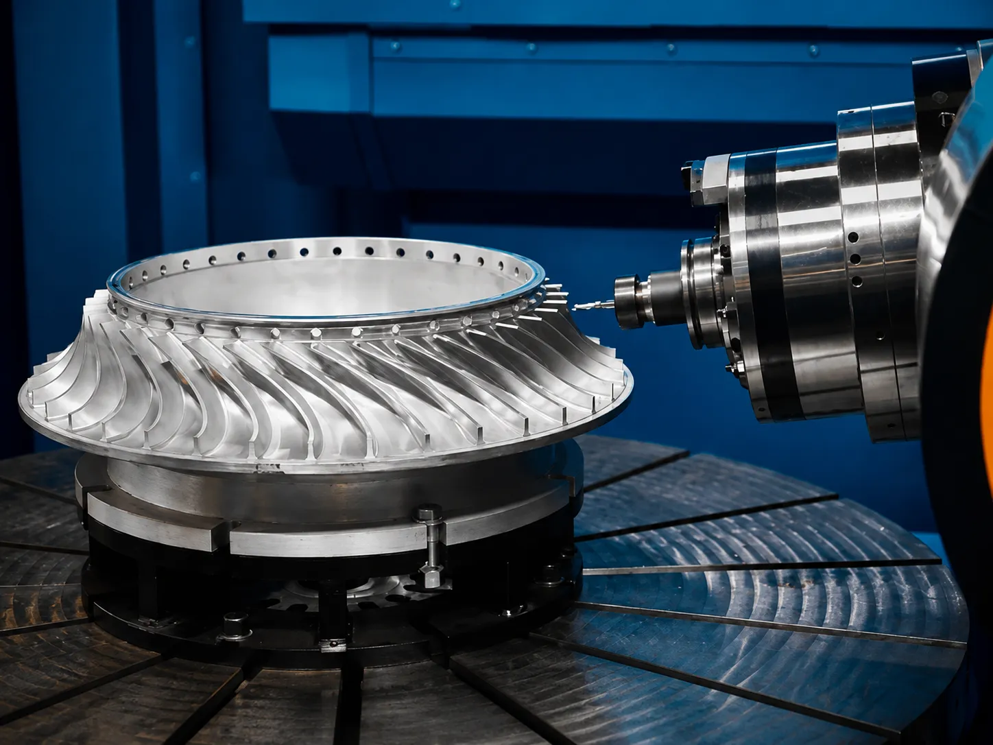 5-axis CNC machining center machining a complex part