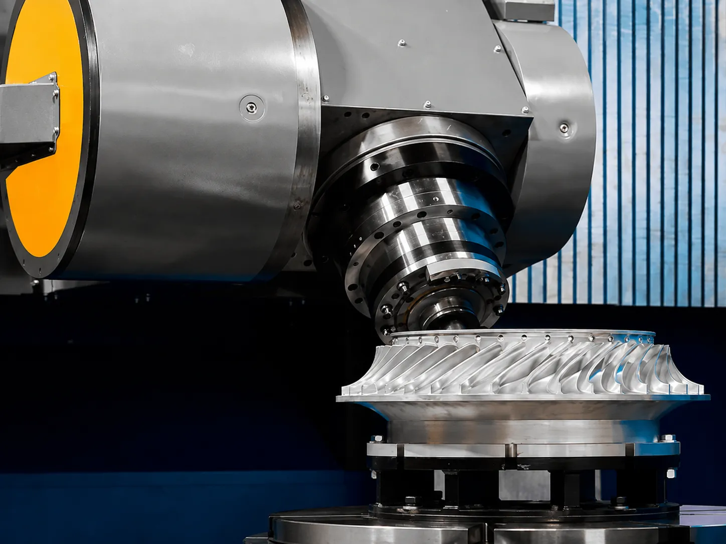 5-axis CNC machining center cutting complex geometry